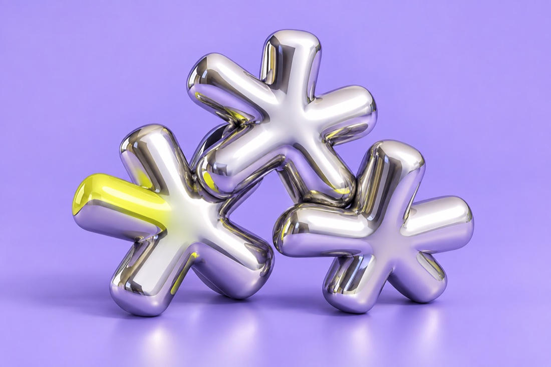 Three interlocking chrome asterisks with a bright yellow accent